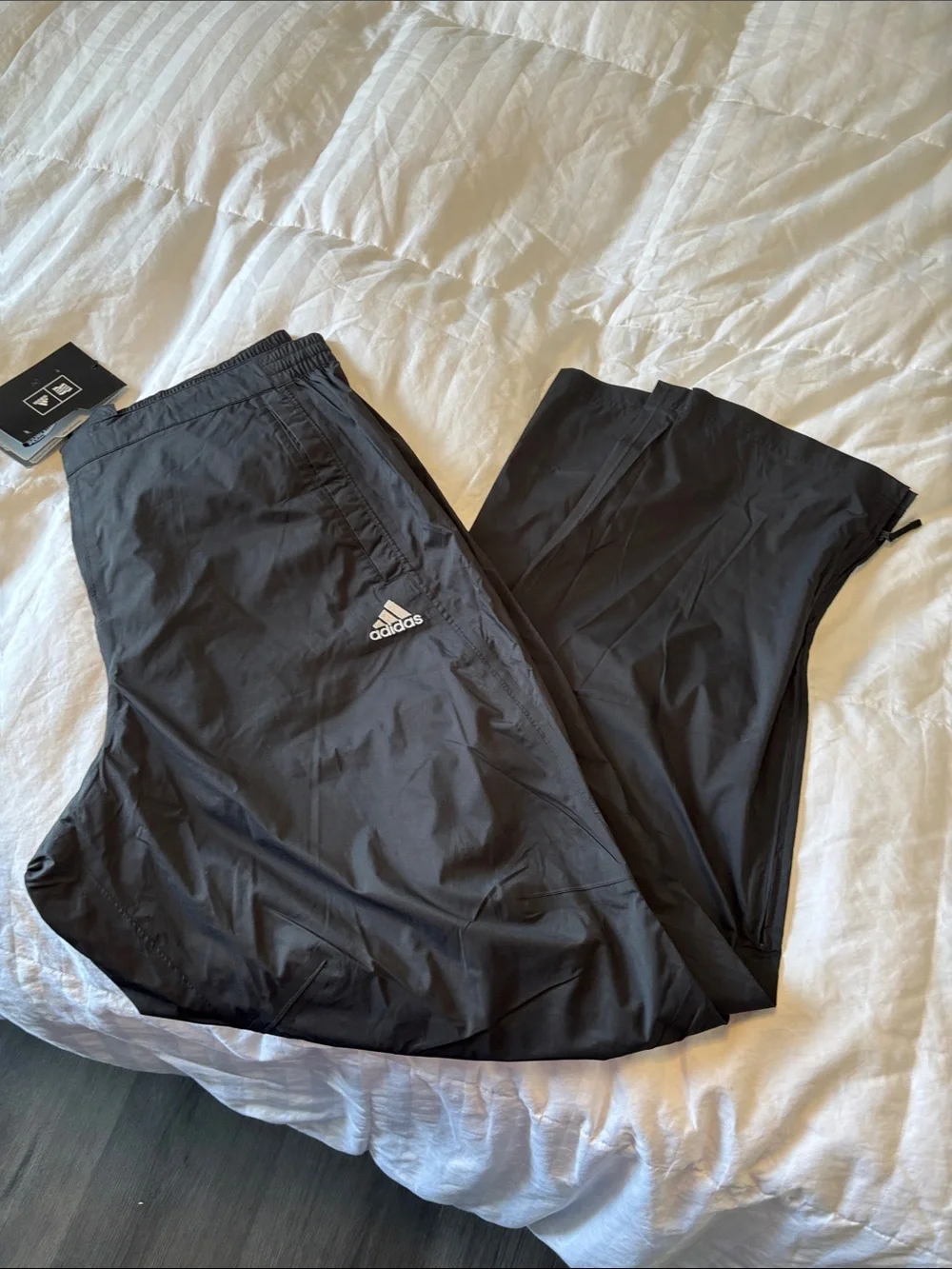 adidas Black Men's Lightweight ClimaProof Rain pants.